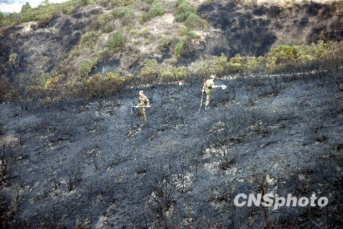 云南石林山火奮戰(zhàn)64小時后撲滅 起因系人為
