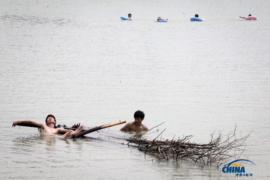 中國日報聚焦全國多地高溫天氣