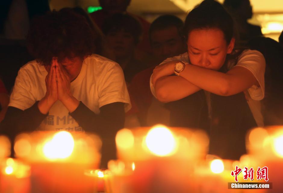 MH370航班失聯滿月 在京乘客家屬舉行祈福活動