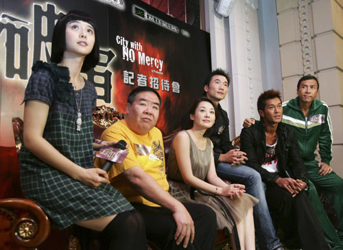 (L-R) Chinese actress Fan Bingbing, Hong Kong actor Kent Cheng, actor Xu Qing, Collin Chou, Louis Koo and Donnie Yen pose during a news conference to promote their movie