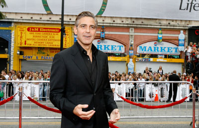 Cast member George Clooney poses at the premiere of