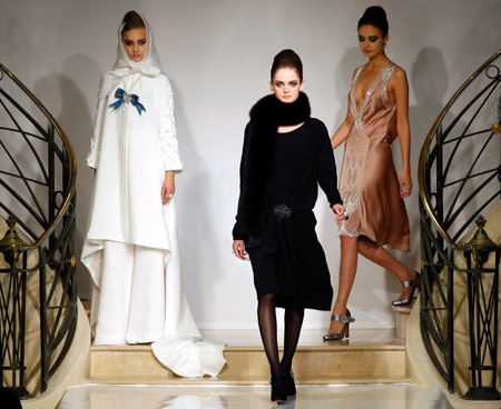 Models present creations by French designer Pascal Millet for Carven as part of his Autumn/Winter 2007-2008 Haute Couture fashion show in Paris, July 4, 2007.